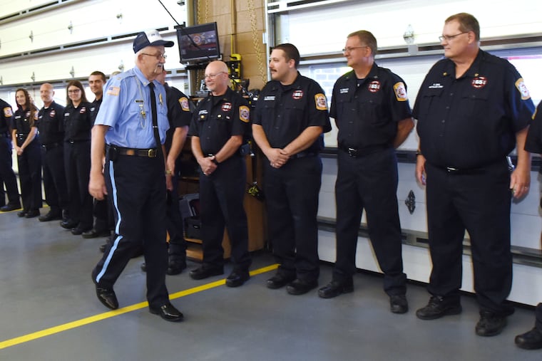 Larry Seip, in blue, a 50-year veteran of the Pennsburg Fire Police, arrives at a ceremony celebrating his golden anniversary on June 9, 2019.