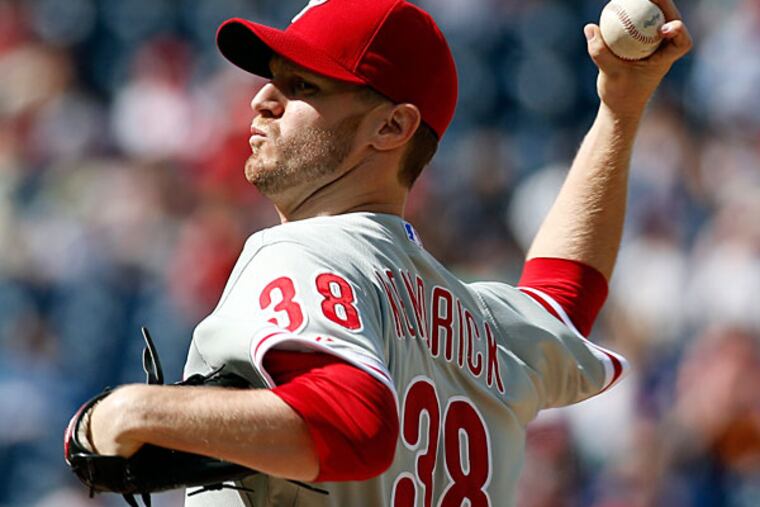 Kyle Kendrick throws during the first inning of a baseball game against the Washington Nationals at Nationals Park Thursday, June 5, 2014, in Washington. (Alex Brandon/AP)