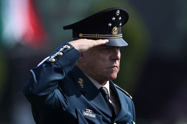 Gen. Salvador Cienfuegos Zepeda is shown saluting soldiers at the Number 1 military camp in Mexico City in April 2016.