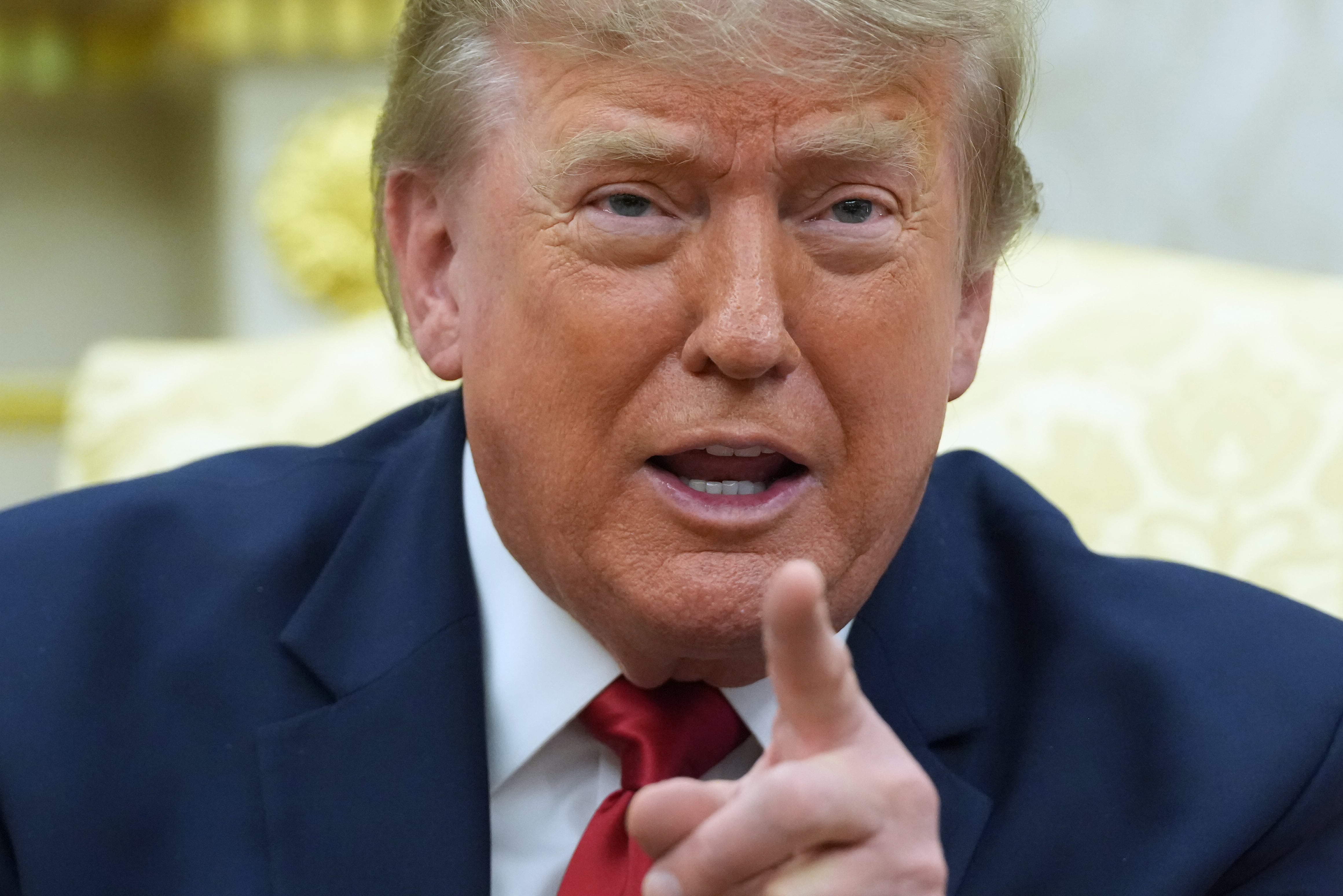The Latest: Trump says ICE should continue traffic stops despite new policy to halt them