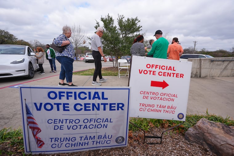 Primary voters arrive to cast ballots at an official vote center in Dallas, Tuesday, March 3, 2026.