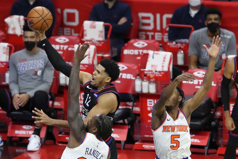 Tobias Harris, center, and the Sixers look to continue their dominance over Julius Randle, left, and the Knicks.