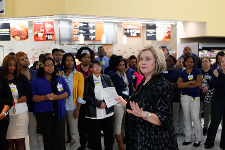 Julie Murphy, northeast division senior vice president of Walmart, talks to store employees at the South Philadelphia store on Tuesday, October 29, 2013. ( MICHAEL S. WIRTZ / Staff )
