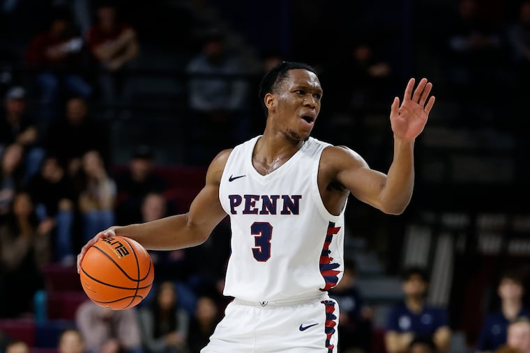 Penn guard Jordan Dingle dribbles the basketball against Temple at The Palaestra on Saturday, December 10, 2022.