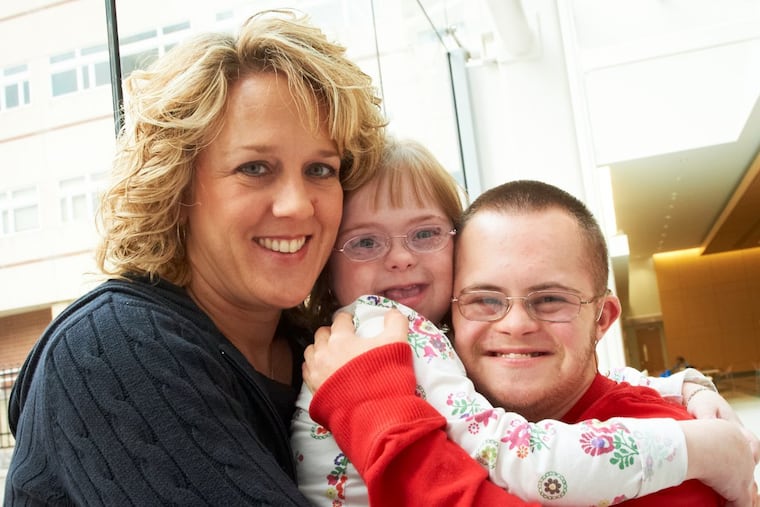 Stephanie Pratico, a program manager at Children’s Hospital of Philadelphia and chairwoman of the New Jersey Council on Developmental Disabilities, with children Sara and John.
