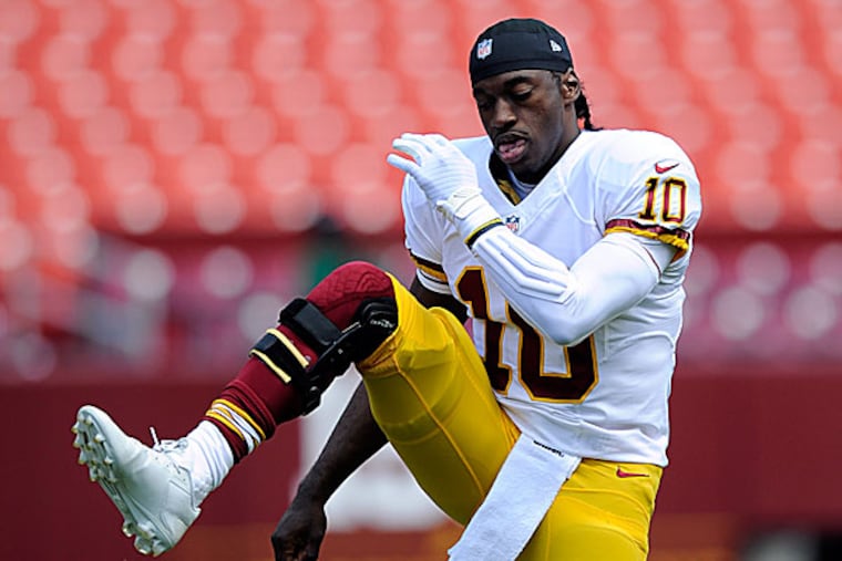 Redskins quarterback Robert Griffin III. (Nick Wass/AP)