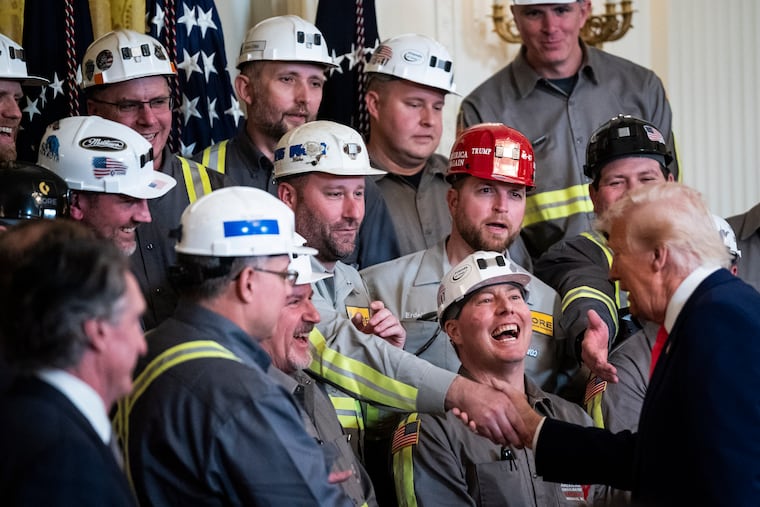 Trump greets coal miners on April 8 at the White House, where he has been holding a flurry of special events in place of rallies. MUST CREDIT: Jabin Botsford/The Washington Post