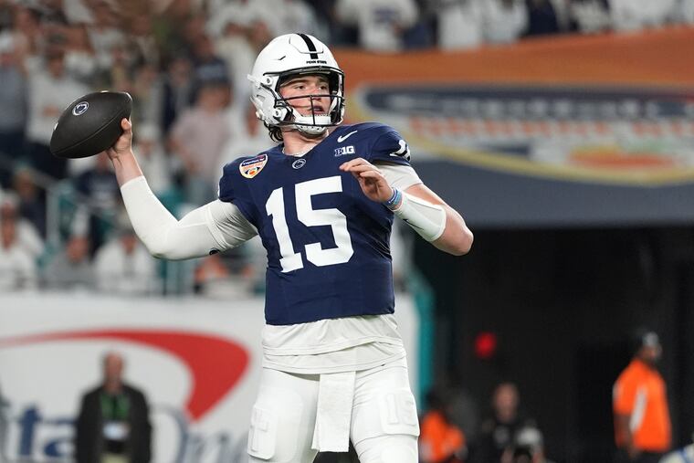 Penn State quarterback Drew Allar throwing a touchdown pass during the College Football Playoff semifinal against Notre Dame.