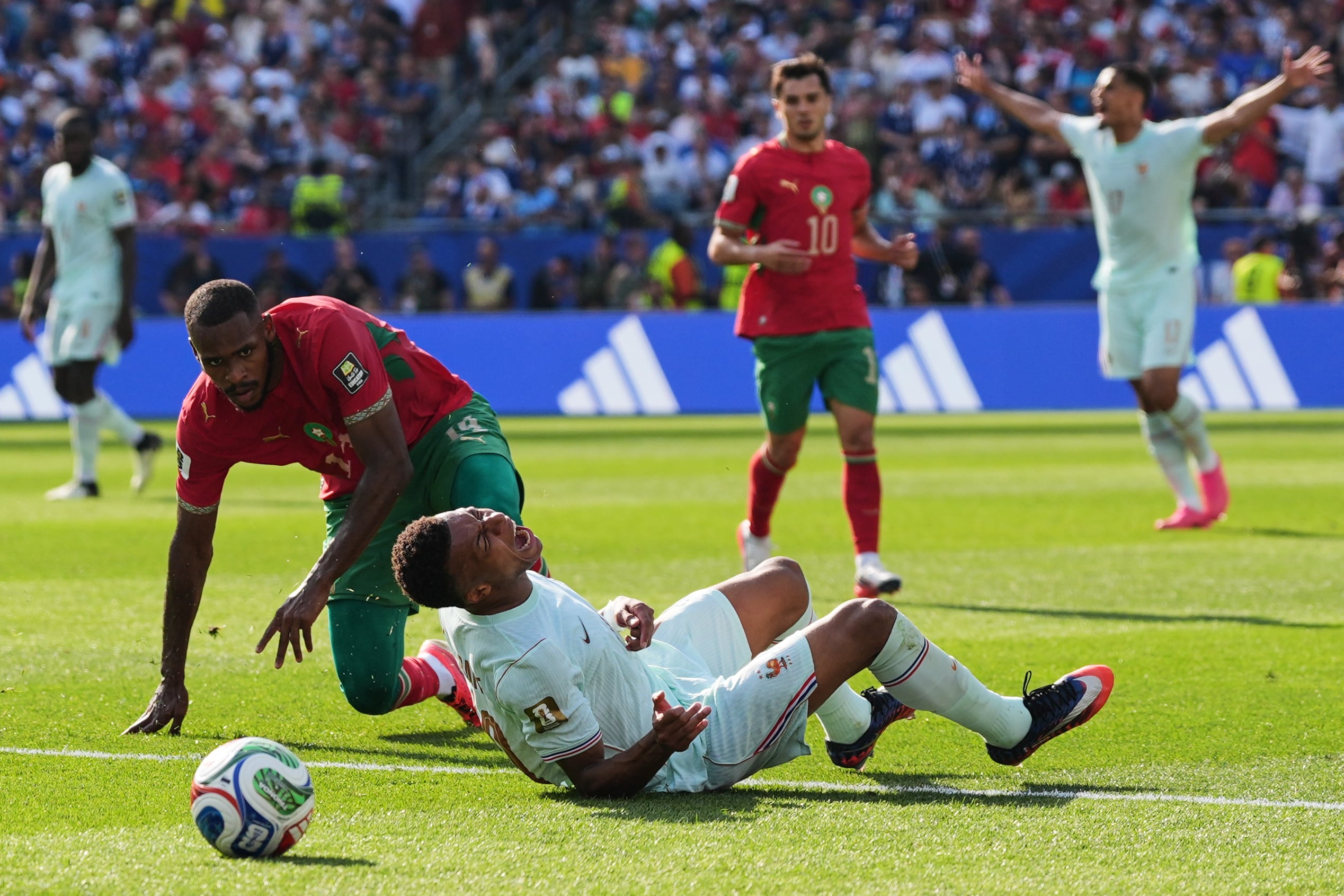 Kylian Mbappé scores his 8th World Cup goal before leaving game with a 'slight' ankle injury