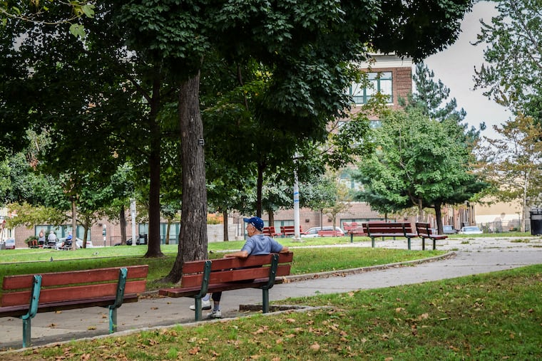 Bernie Pirnie sits on a bench in Campbell Square on East Allegheny Avenue in Kensington on Monday October 1, 2018. In June, 19-year-old Anthony Cheever was shot and killed in the park.