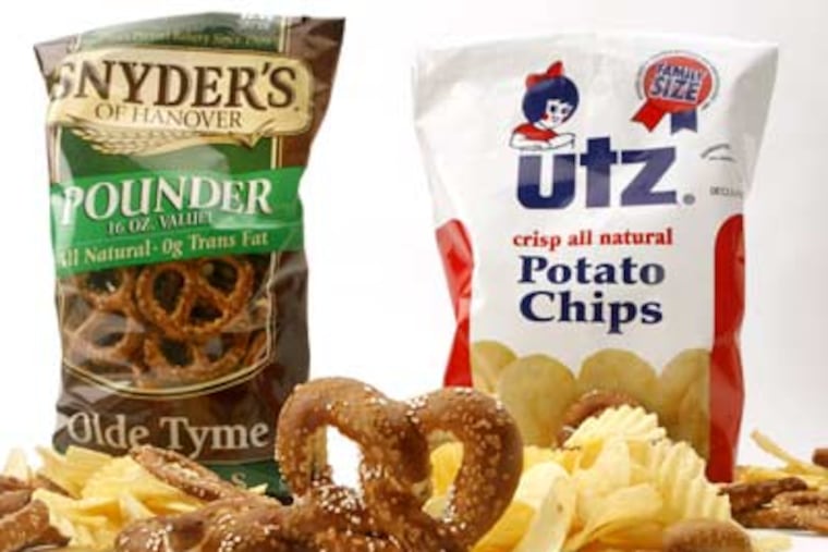 After the companies merge, Snyder's of Hanover and Utz Quality Foods will have less reason to continue their decades-long York County, Pa., rivalry. (Charles Fox / Staff Photographer)