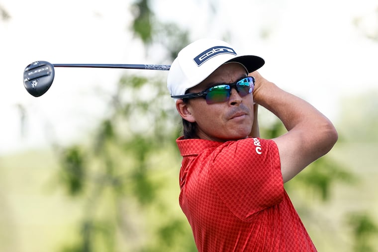 Rickie Fowler tees off on the first hole of the first round during the Truist Championship at the Philadelphia Cricket Club's Wissahickon Course.