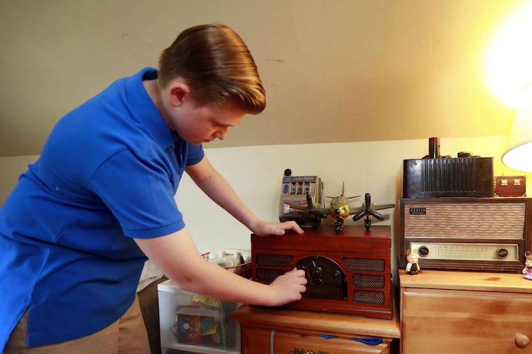 Joey Warchal, 13, is an antique expert from Somerton who has a vintage radio to make Al Capone's prison cell at Eastern State Penitentiary more authentic.
