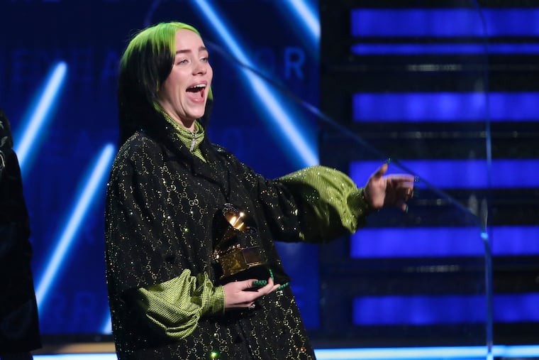 Billie Eilish accepts the award for record of the year for "Bad Guy" at the 62nd annual Grammy Awards on Sunday, Jan. 26, 2020, in Los Angeles. (Photo by Matt Sayles/Invision/AP)