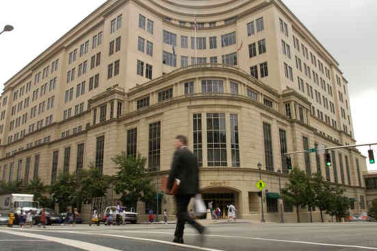 Larry Hrebiniak, right, found out that creditors could change terms "at any time for any reason." MBNA, above, doubled the Penn professor's 8 percent rate, giving him no reason.