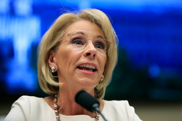 FILE - In this April 10, 2019 file photo, Education Secretary Betsy DeVos testifies before the House Education and Labor Committee at a hearing on 'Examining the Policies and Priorities of the U.S. Department of Education' on Capitol Hill in Washington.DeVos has issued new rules on loan forgiveness for students defrauded by their colleges, a rewrite of Obama-era regulations that advocates say will make it tougher for students to get any relief. DeVos says schools that defraud students must be held accountable but that the Obama rule, which was aimed at for-profit colleges, wasn’t working.