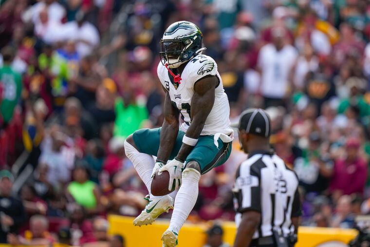 Philadelphia Eagles wide receiver A.J. Brown celebrates his touchdown against the Washington Commanders during the second half of an NFL football game, Sunday, Oct. 29, in Landover, Md.