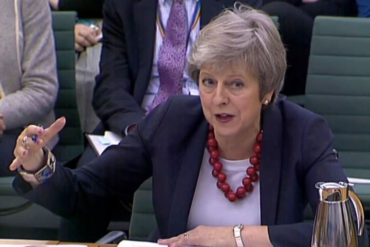 Prime Minister Theresa May gives evidence before the Liaison Committee on matters relating to Brexit at Portcullis House in London, Thursday, Nov. 29, 2018. The governor of the Bank of England Mark Carney says most British businesses aren't ready for a no-deal departure from the European Union as lawmakers from all parties are criticising the agreement Prime Minister May negotiated with the EU, increasing the likelihood of a no-deal Brexit. (PA via AP)