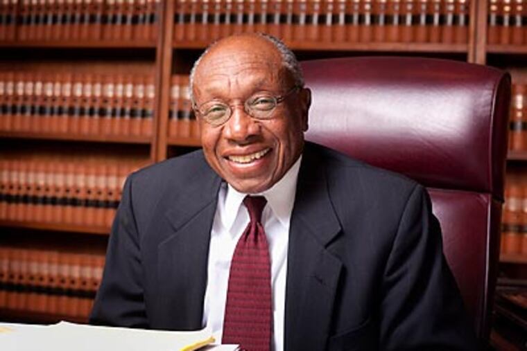 Emily Lounsberry writes about Bucks County judge Clyde Waite photographed here in his office. (Ed Hille / Staff Photographer)