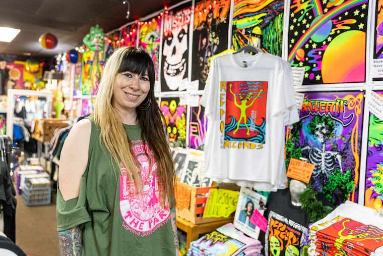Jacci Weaver, 39, of South Philadelphia, creative director at Repo Records, poses for a portrait inside the record shop in Philadelphia.