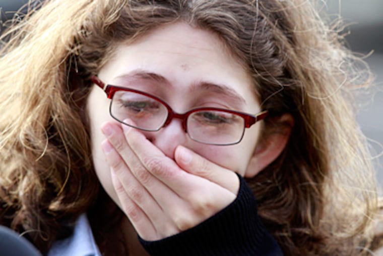 Jessica Barbalalaci, 17, a junior from Morrisville, reacts to the news that Conwell Egan High School will be closed. (David Swanson / Staff Photographer)