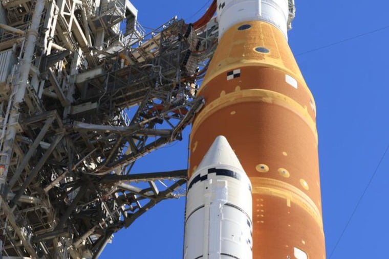 This image provided by NASA shows NASA's moon rocket on the pad at Kennedy Space Center in Florida on Thursday.