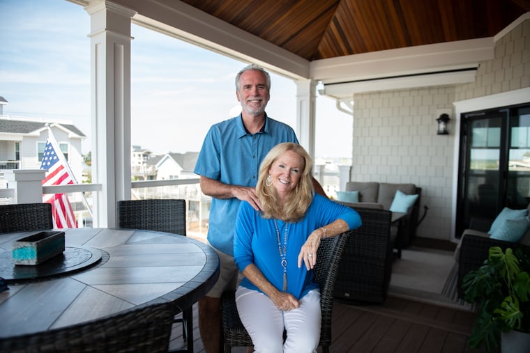 Andy and Tina Glemser on the balcony of their home in Strathmere, N.J. “Coming to the Shore gives everyone a reason to get together,” Andy said.