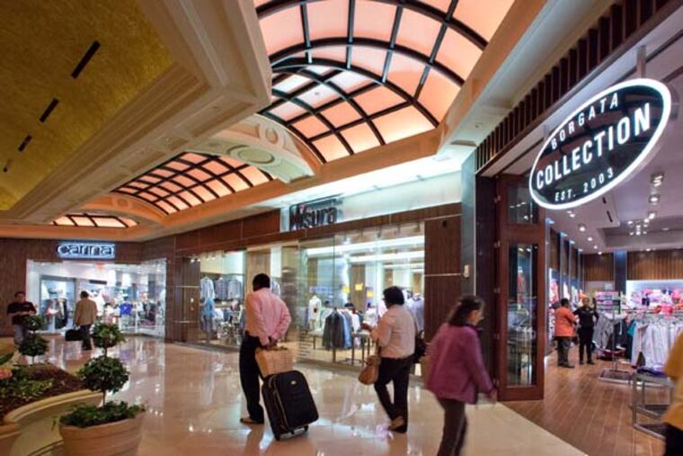 View of (left to right) Carina, Misura and the Borgata Collection stores at the Retail Piazza at the Borgata in Atlantic City, April 19, 2013. ( DAVID M WARREN / Staff Photographer )