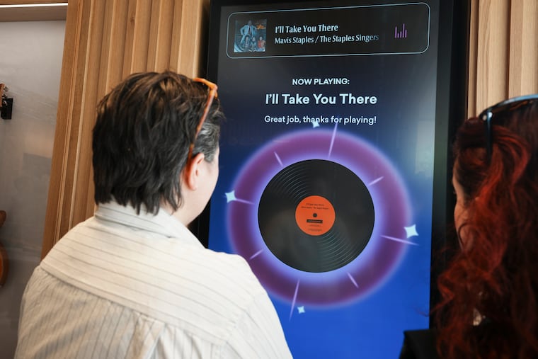 An interactive jukebox in the Highmark Mann Center's welcome center tests knowledge and rewards users by playing a piece of music at the end.