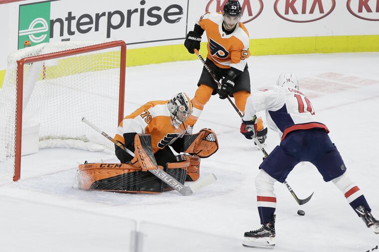 Carter Hart makes a save in the second period of a recent game against Washington. The rookie will likely play most of the Flyers' remaining games.