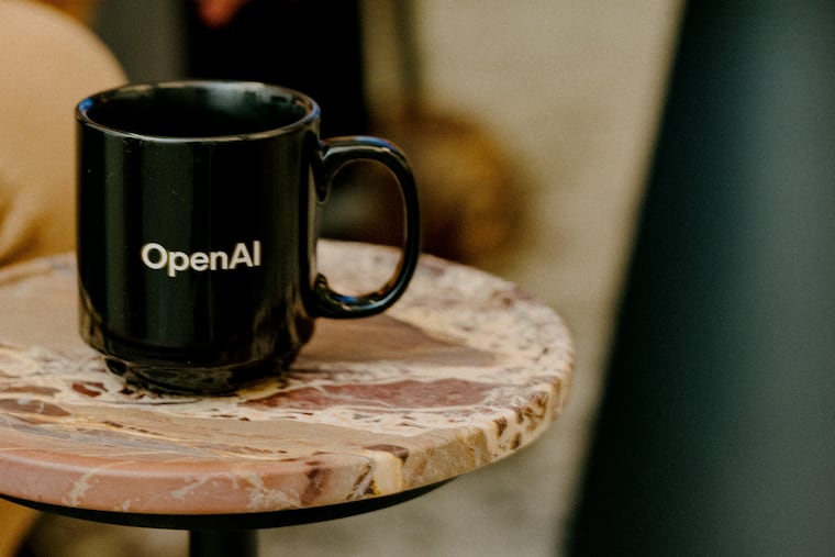 FILE — A company-branded mug at OpenAI’s office in San Francisco, Nov. 3, 2025. A week after OpenAI made headlines with an AI-generated proof, a new “declaration” by 16 experts raises concerns that the technology threatens math as a discipline.