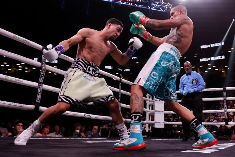 NEW YORK, NEW YORK - JULY 30: Danny Garcia (L) fights Jose Benavidez Jr. during their super welterweight boxing match at Barclays Center on July 30, 2022 in in the Brooklyn borough of New York. (Photo by Adam Hunger/Getty Images)