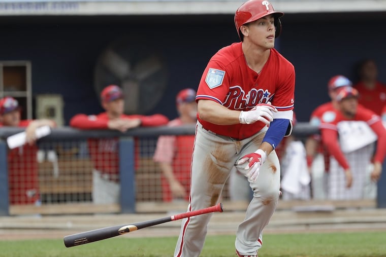 Phillies Scott Kingery tosses his bat after hitting a two-run third-inning home run against the Tampa Bay Rays during a spring training game at the Charlotte Sports Park in Port Charlotte, FL on Friday, March 2, 2018.
