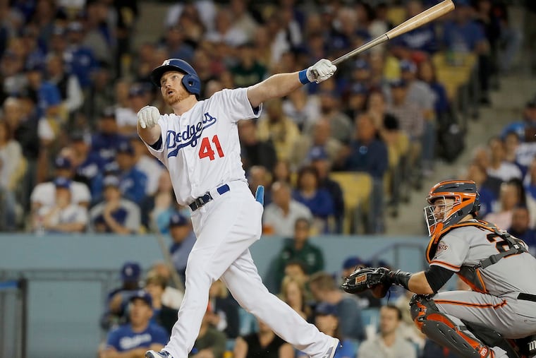 Kyle Garlick hitting a two-run home run for the Dodgers last June.