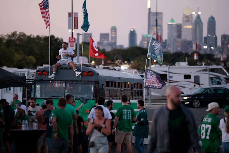 Donny Hoffman of South Philadelphia sits on top of a party bus while tailgating before the Minnesota Vikings vs. Philadelphia Eagles NFL game at Lincoln Financial Field in Philadelphia on Thursday, Sept. 14, 2023.