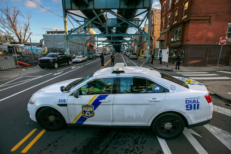 Philadelphia police at a crime scene earlier this month on Kensington Avenue at East Tusculum Street. They were back Saturday morning at Kensington and East Clearfield Street for the stabbing of a security guard.