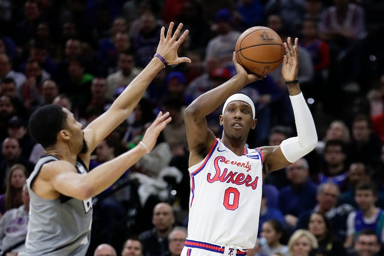 Sixers guard Josh Richardson shoots the basketball over Brooklyn Nets guard Spencer Dinwiddie last week.