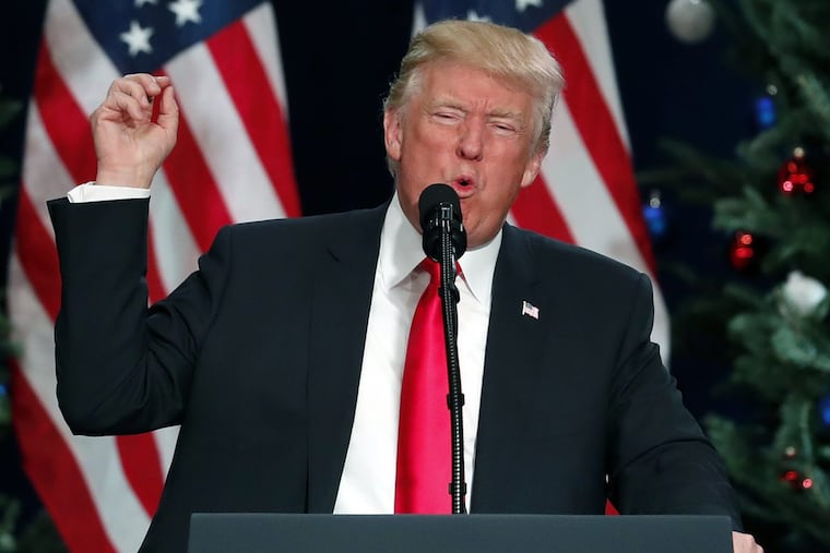 In this Nov. 29 photo, President Trump speaks about tax reform in St. Charles, Mo.