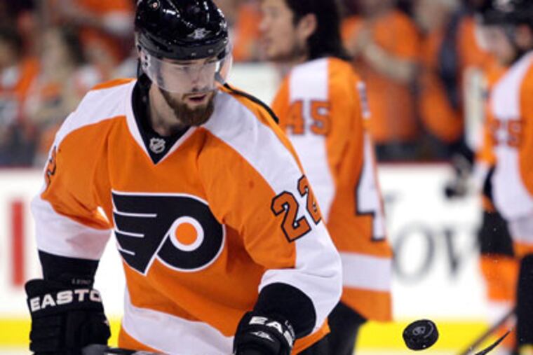 Forward Ville Leino has become an integral part of Danny Briere's line, and in getting the team to the Cup Finals. (Yong Kim / Staff Photographer)