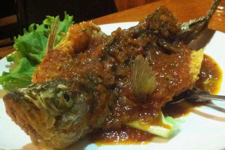 Crispy whole striped bass with Thai sauce at the Banana Leaf.