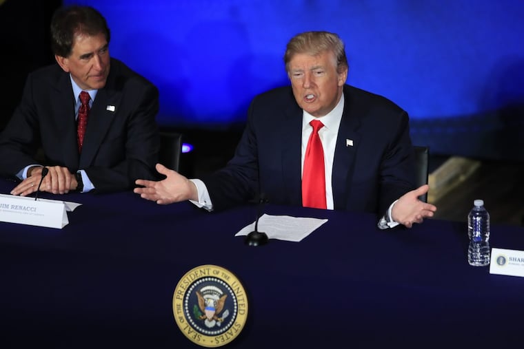 President Trump with Rep. Jim Renacci (R., Ohio) left, speaks during a roundtable discussion on tax reform at Cleveland Public Auditorium and Conference Center in Cleveland, Ohio.