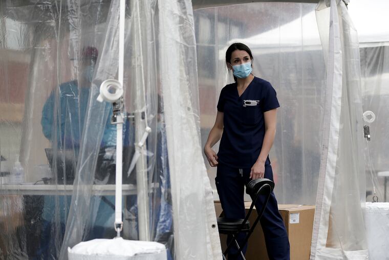 Dr. Morgan Hutchinson, director at the new Jefferson St. Raymond COVID-19 testing site, stands at the site on Oct. 1. It is funded by the city of Philadelphia and run by Jefferson Health at St. Raymond of Penafort Church in Philadelphia.