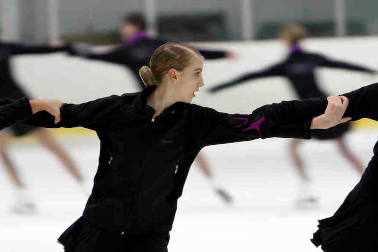 Marina Tomlinson practices with the Symmetry synchronized skating team. Members range in age from 13 to 18 and are proud of being sturdy and tough.