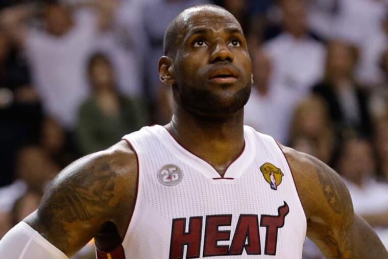 LeBron James (6) looks up during overtime of Game 6 of the NBA Finals basketball game against the San Antonio Spurs, Wednesday, June 19, 2013 in Miami. The Heat defeated the Spurs 103-100. (AP Photo/Lynne Sladky)