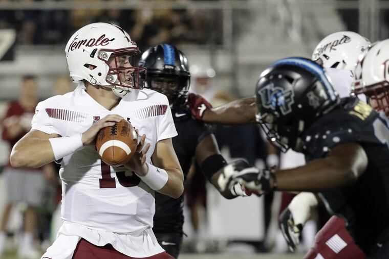 Temple quarterback Anthony Russo looks for a receiver as he is pressured by the Central Florida defense during the first half of an NCAA college football game Thursday, Nov. 1, 2018, in Orlando, Fla. (AP Photo/John Raoux)