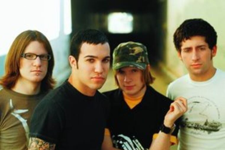 Fall Out Boy , above, performed at Camden's Tweeter Center on Friday. The Academy Is . . .and +44 also were on stage.