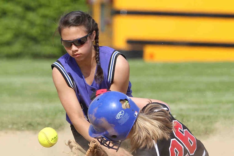 Hatboro-Horsham's Maggie Leisch slides into second safely with a steal as the throw pops loose from C.B. South's Lauren Lawlor.