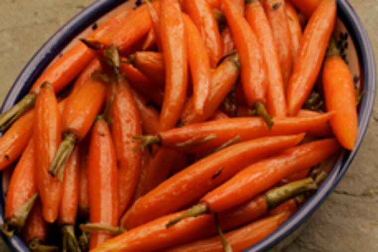 Honey Glazed Carrots, blanched, baked and caramelized to perfection, make a great partner for ham.