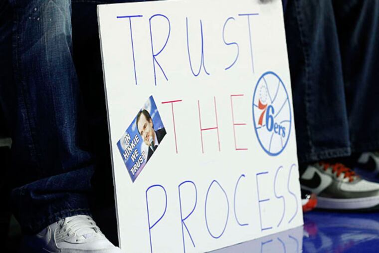 A Sixers fan shows support for Sam Hinkie's plan during last night's game at the Wells Fargo Center.