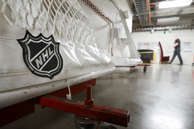 Goals used by the NHL hockey club Nashville Predators are stored in a hallway in Bridgestone Arena in Nashville, Tenn. The National Hockey League and players reached a tentative deal Friday, Dec. 18, 2020, to hold a 56-game season in 2021, pending the approval of each side's executive board and Canadian health officials.
